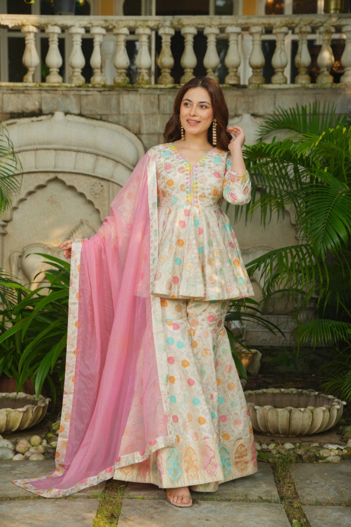 Rajwada Glow silk peplum top , sharara with duptta