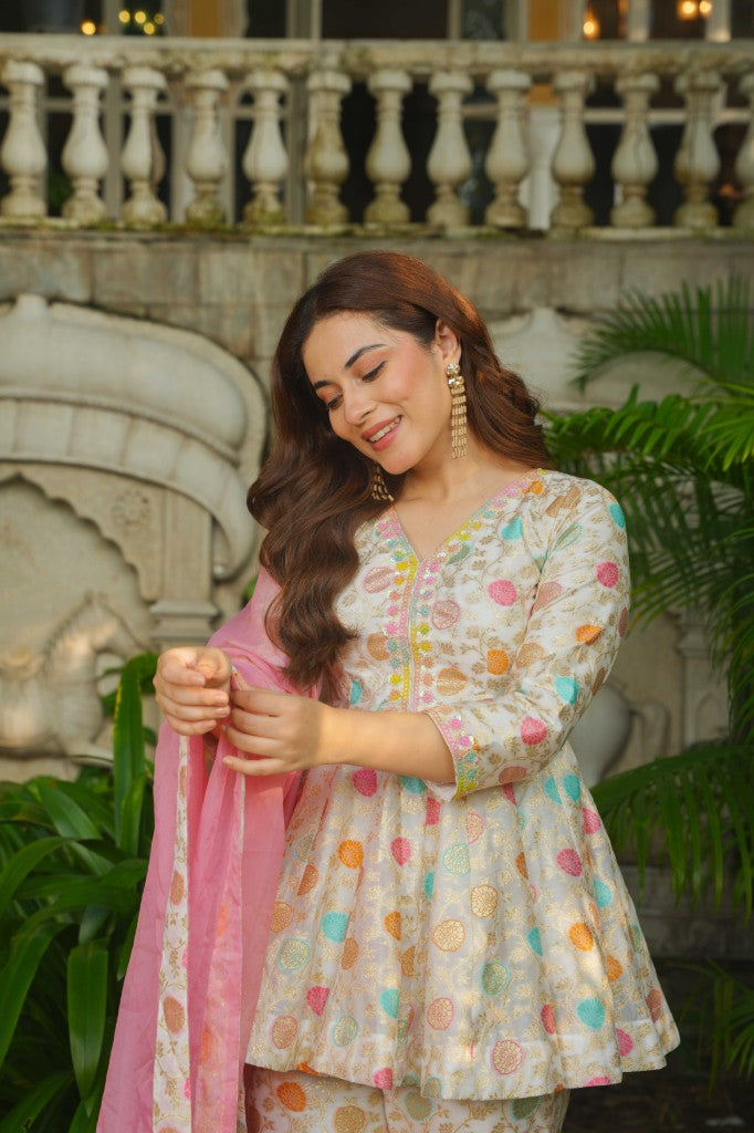 Rajwada Glow silk peplum top , sharara with duptta