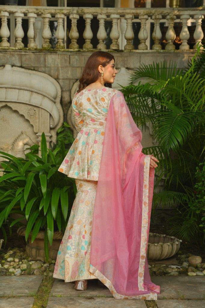 Rajwada Glow silk peplum top , sharara with duptta